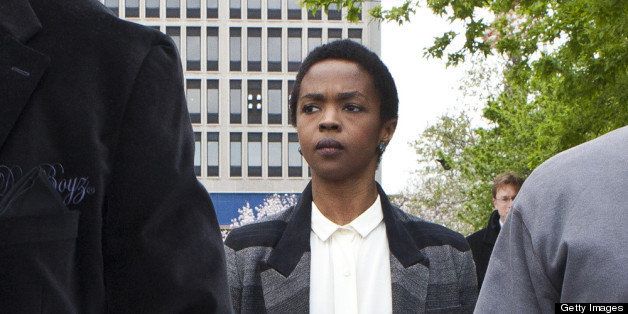 NEWARK, NJ - APRIL 22: Signer Lauryn Hill is seen leaving court after the judge postpones her sentencing and gave her two weeks to pay back taxes April 22, 2013 in Newark, New Jersey. Hill pleaded guilty to tax evasion charges in June 2012 for failure to pay federal taxes on USD 1.8 million earned from 2005-2007. She faces a maximum one-year jail sentence for each of the three accounts. (Photo by Kena Betancur/Getty Images)