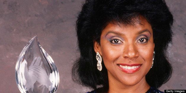 BEVERLY HILLS, CA - 1989: Actress and star of 'The Cosby Show,' Phylicia Rashad, poses with her People's Choice Award in a 1989 backstage Beverly Hills, California telecast photo shoot. She won the award for her acting starring opposite Bill Cosby as 'Clair Huxtable.' (Photo by George Rose/Getty Images)