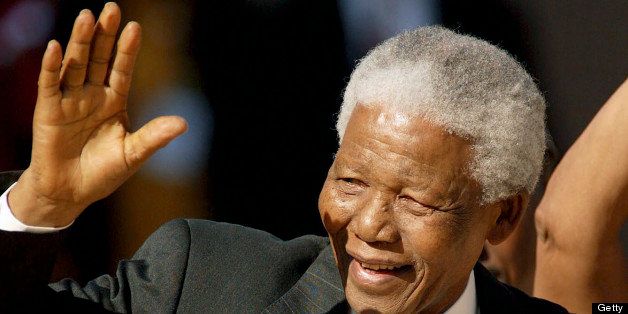 SOUTH AFRICA - APRIL 27: Former President Nelson Mandela waves at the crowd on arrival at the inauguration ceremony at the Union Building in Pretoria. South Africa. (Photo by Media24/Gallo Images/Getty Images)