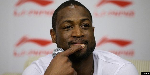 BEIJING, CHINA - JULY 03: NBA Player Dwyane Wade answers media questions during a promotion event of Chinese sports brand Li Ning on July 3, 2013 in Beijing, China. (Photo by Feng Li/Getty Images)