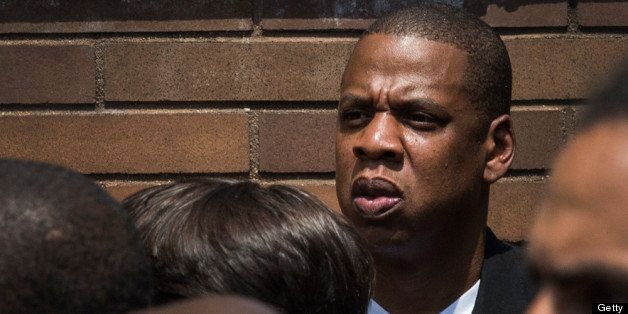 NEW YORK, NY - JULY 20: Musician Jay-Z attends a rally in support of Trayvon Martin, organized by the Reverend Al Sharpton, in response to the non-guilty verdict for George Zimmerman on July 20, 2013 in New York City. In February 2012, Zimmerman shot and killed Trayvon Martin, a teenager, in Sanford, FL; he was found not guilty of murder due to Stand-Your-Ground laws. Protests have continued across the country since Zimmerman was found not guilty on July 13, 2013. (Photo by Andrew Burton/Getty Images)