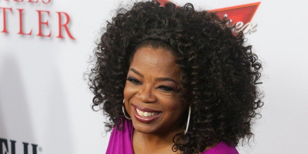 LOS ANGELES, CA - AUGUST 12: Oprah Winfrey attends LEE DANIELS' THE BUTLER Los Angeles premiere, hosted by TWC, Budweiser and FIJI Water, Purity Vodka and Stack Wines, held at Regal Cinemas L.A. Live on August 12, 2013 in Los Angeles, California. (Photo by Mike Windle/Getty Images for TWC)