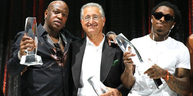 NEW YORK, NY - AUGUST 22: Birdman, BMI President and CEO, Del Bryant and Lil Wayne speak onstage at the 2013 BMI R&B/Hip-Hop
