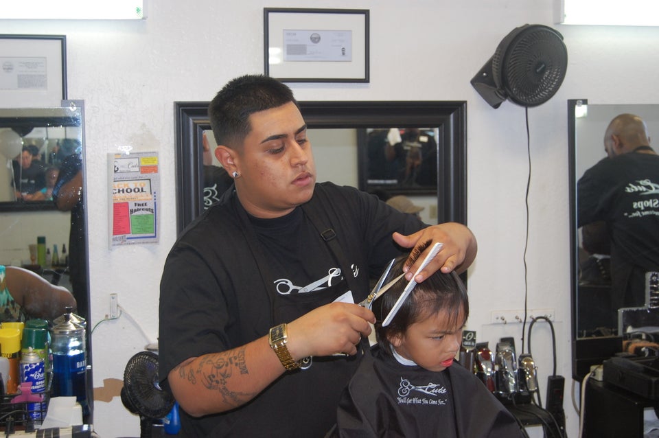 Oakland E Cuts, Donates Haircuts And School Supplies For