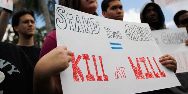 MIAMI, FL - APRIL 09: Grace Miranda and other supporters of Trayvon Martin gather for a rally in front of Florida Senator Marco Rubio's (R-FL) office to ask him to retract his support for Florida's so called 'Stand Your Ground' gun law following the Trayvon Martin killing on April 9, 2012 in Miami, Florida. Martin was killed by George Michael Zimmerman on February 26th while Zimmerman was on neighborhood watch patrol in the gated community of The Retreat at Twin Lakes, Florida. (Photo by Joe Raedle/Getty Images)