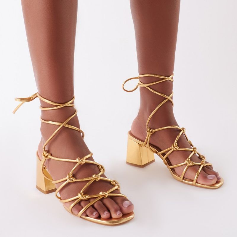 The knotted heel has been a hit over the summer months as a secure but fun party friend. It's also the ultimate pick-me-up when the weather and your mood are similarly grey and grumpy.&nbsp;Freya Knotted Strappy Block Heeled Sandals, sizes 4-7 available, &pound;29.99, Public Desire.