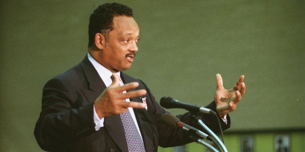 UNITED STATES - FEBRUARY 24: BOOK SIGNING -- The Reverend Jesse L. Jackson, Sr. and his son Jesse L. Jackson, Jr. during the reading and book signing of the co-authors new book 'It's About The Money' at the Martin Luther King Memorial Library in Washington D.C. (Photo by Douglas Graham/Congressional Quarterly/Getty Images)