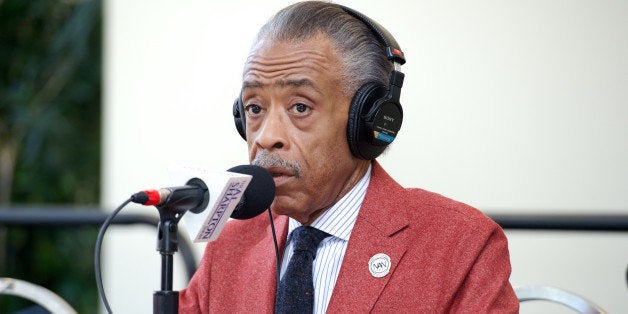 WASHINGTON, DC - SEPTEMBER 18: Al Sharpton broadcasts live on Day 1 of the 43rd Annual Legislative Conference on September 18, 2013 in Washington, DC. (Photo by Earl Gibson III/Getty Images)