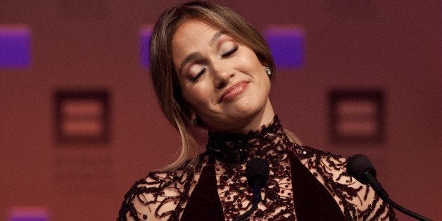 US singer and actress Jennifer Lopez speaks after receiving the Ally for Equality Award at 2013 at the Human Rights Campaign's 17th National Dinner in Washington on October 5, 2013. The Ally for Equality Award recognizes the efforts of those who dedicate time, energy, spirit and commitment to better the lives of LGBT people. AFP PHOTO/Nicholas KAMM (Photo credit should read NICHOLAS KAMM/AFP/Getty Images)