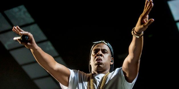 LONDON, UNITED KINGDOM - OCTOBER 10: Jay Z performs on stage at O2 Arena on October 10, 2013 in London, England. (Photo by Neil Lupin/Redferns via Getty Images)