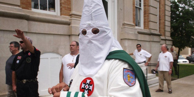 PULASKI, TN - JULY 11: Members of the Fraternal White Knights of the Ku Klux Klan participate in the 11th Annual Nathan Bedford Forrest Birthday march July 11, 2009 in Pulaski, Tennessee. With a poor economy and the first African-American president in office, there has been a rise in extremist activity in many parts of America. According to the Southern Poverty Law Center in 2008 the number of hate groups rose to 926, up 4 percent from 2007, and 54 percent since 2000. Nathan Bedford Forrest was a lieutenant general in the Confederate Army during the American Civil War and played a role in the postwar establishment of the first Ku Klux Klan organization opposing the reconstruction era in the South. (Photo by Spencer Platt/Getty Images)