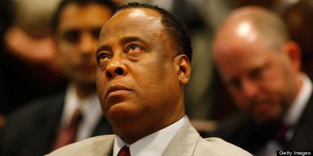 LOS ANGELES, CA - FEBRUARY 8: Dr. Conrad Murray looks up as he is arraigned in the County of Los Angeles Airport Branch Courthouse on a charge of involuntary manslaughter in connection with the death of pop star Michael Jackson on February 8, 2010 in Los Angeles, California. Murray was personal physician to Michael Jackson when he died from an overdose of a powerful prescription sedative at the age of 50 on June 25. Jackson was rehearsing for a 50-concert comeback series at the O2 arena in London while staying at a rented estate in the Holmby Hills area of Los Angeles. He was pronounced dead at nearby Ronald Reagan UCLA Medical Center. (Photo by Mark Boster-Pool/Getty Images)