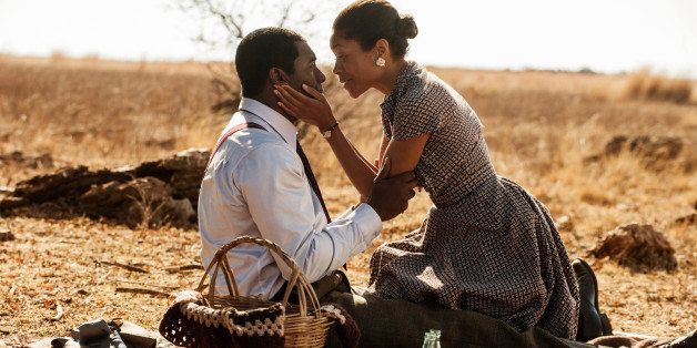 UNSPECIFIED LOCATION, UNSPECIFIED DATE: In this handout photo provided by The Weinstein Compan, Idris Elba (L) and Naomie Harris are seen on the set of 'Mandela: Long Walk to Freedom'. (Photo by Keith Bernstein/The Weinstein Company via Getty Images)