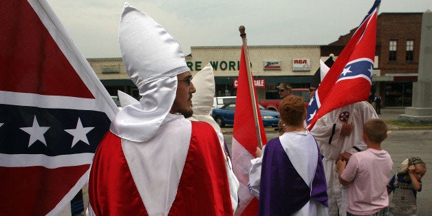 PULASKI, TN - JULY 11: Members of the Fraternal White Knights of the Ku Klux Klan participate in the 11th Annual Nathan Bedford Forrest Birthday march July 11, 2009 in Pulaski, Tennessee. With a poor economy and the first African-American president in office, there has been a rise in extremist activity in many parts of America. According to the Southern Poverty Law Center in 2008 the number of hate groups rose to 926, up 4 percent from 2007, and 54 percent since 2000. Nathan Bedford Forrest was a lieutenant general in the Confederate Army during the American Civil War and played a role in the postwar establishment of the first Ku Klux Klan organization opposing the reconstruction era in the South. (Photo by Spencer Platt/Getty Images)