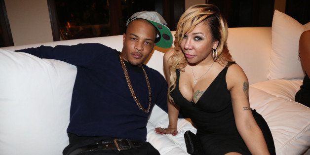 MIAMI BEACH, FL - DECEMBER 31: (L-R) T.I. and Tameka 'Tiny' Harris attend Sean Diddy Combs Ciroc The New Years Eve Party at his home on December 31, 2013 in Miami Beach, Florida. (Photo by Johnny Nunez/WireImage)
