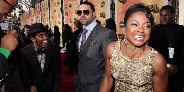 ATLANTA, GA - NOVEMBER 17: (L-R) Lloyd, Apollo Nida, and Phaedra Parks attend the Soul Train Awards 2011 at The Fox Theatre