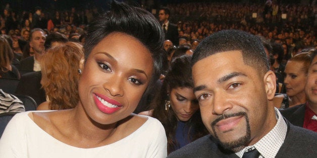 LOS ANGELES, CA - JANUARY 08: Recording artist/actress Jennifer Hudson (L) and pro wrestler/actor David Otunga attend The