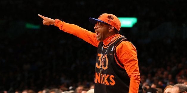 NEW YORK, NY - DECEMBER 11: (NEW YORK DAILIES OUT) Film director Spike Lee attends the NBA game between the Brooklyn Nets and the New York Knicks at Barclays Center on December 11, 2012 in the Brooklyn borough of New York City.The Knicks defeated the Nets 100-97. NOTE TO USER: User expressly acknowledges and agrees that, by downloading and/or using this Photograph, user is consenting to the terms and conditions of the Getty Images License Agreement. (Photo by Jim McIsaac/Getty Images) 