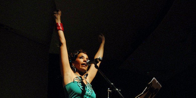 DETROIT, MI - MARCH 17: Jessica Care Moore performs at the Charles H. Wright Museum of African American History on March 17, 2012 in Detroit, Michigan. (Photo by Paul Warner/Getty Images)