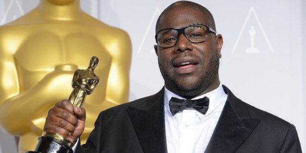 Director Steve McQueen, winner of Best Motion Picture for 'Twelve Years A Slave' posesin the press room during the 86th Academy Awards on March 2nd, 2014 in Hollywood, California. AFP PHOTO / Joe KLAMAR (Photo credit should read JOE KLAMAR/AFP/Getty Images)