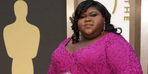 HOLLYWOOD, CA - MARCH 2: Gabourey Sidibe arrives at the 86th Annual Academy Awards at Hollywood & Highland Center on March 2, 2014 in Los Angeles, California. (Photo by Dan MacMedan/WireImage)