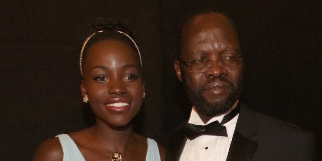 HOLLYWOOD, CA - MARCH 02: Actress Lupita Nyong'o, winner of Best Performance by an Actress in a Supporting Role (L) and Pete