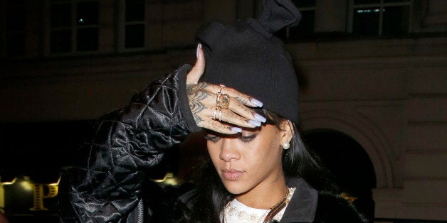 LONDON, UNITED KINGDOM - MARCH 27: Rihanna seen arriving at the private members club Tramp with Drake on March 27, 2014 in London, England. (Photo by Tom Phelan/GC Images)