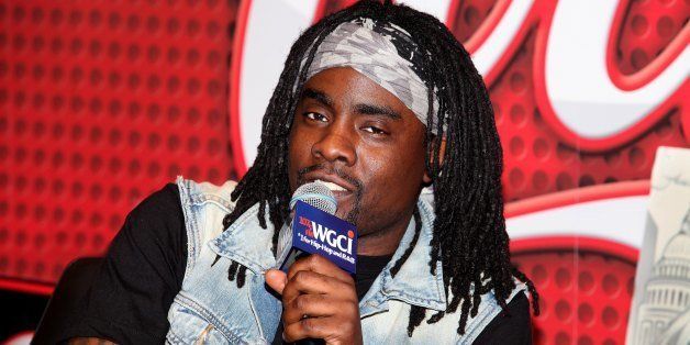 CHICAGO - JUNE 13: Rapper Wale is interviewed and answers questions from radio station listeners during his visit to the WGCI-FM 'Coca-Cola Lounge' in Chicago, Illinois on JUNE 13, 2013. (Photo By Raymond Boyd/Getty Images) 