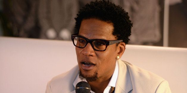 MIAMI GARDENS, FL - MARCH 15: Host D.L. Hughley attends Day 1 of Jazz In The Gardens at Sun Life Stadium on March 15, 2014 in Miami Gardens, Florida. (Photo by Larry Marano/Getty Images for Jazz In The Gardens)