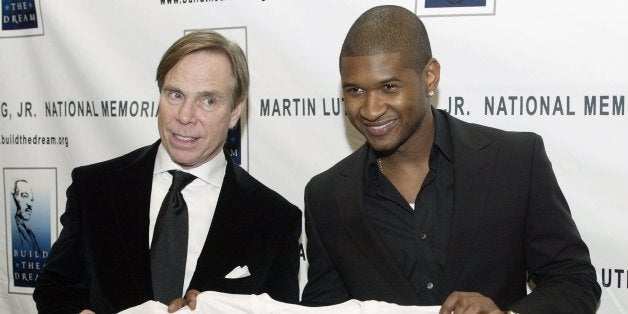 BEVERLY HILLS - FEBRUARY 28: (L-R) Designer Tommy Hilfiger and recording artist Usher attend the Los Angeles Dream Dinner benefiting the Martin Luther King Jr., National Memorial at the Regeant Beverly Wilshire Hotel on February 28, 2006 in Beverly Hills, California. (Photo by Frederick M. Brown/Getty Images).