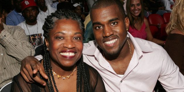 MIAMI - AUGUST 29: Kanye West and his mother attend the 2004 MTV Video Music Awards at the American Airlines Arena August 29, 2004 in Miami, Florida. (Photo by Frank Micelotta/Getty Images) 