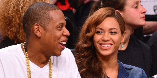 NEW YORK, NY - MAY 12: Jay-Z and Beyonce attend the Miami Heat vs Brooklyn Nets game at Barclays Center on May 12, 2014 in the Brooklyn borough of New York City. (Photo by James Devaney/GC Images)