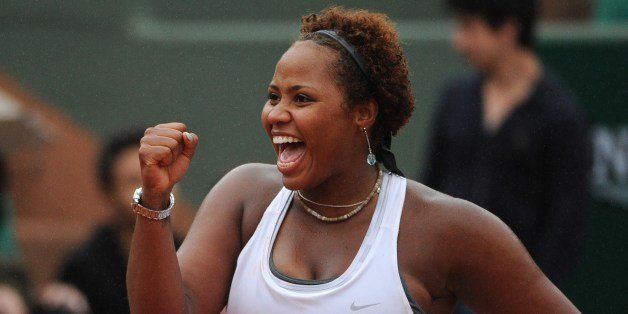 USA's Taylor Townsend celebrates her victory over France's Alize Cornet at the end of their French tennis Open second round match at the Roland Garros stadium in Paris on May 28, 2014. AFP PHOTO / DOMINIQUE FAGET (Photo credit should read DOMINIQUE FAGET/AFP/Getty Images)