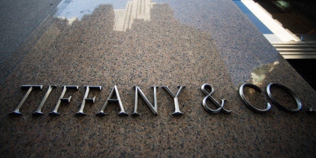 Tiffany and Co. signage is displayed outside the company's flagship store in New York, U.S., on Tuesday, March 18, 2014. Tiff