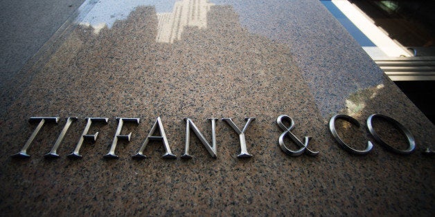 Tiffany and Co. signage is displayed outside the company's flagship store in New York, U.S., on Tuesday, March 18, 2014. Tiffany & Co. is expected to release earnings figures on March 21. Photographer: Craig Warga/Bloomberg via Getty Images