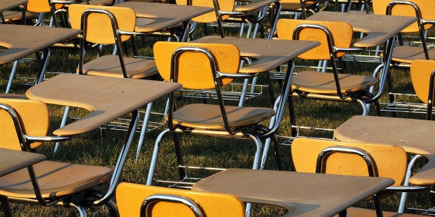 WASHINGTON, DC - JUNE 20: An installation of 857 empty school desks, representing the number of students...