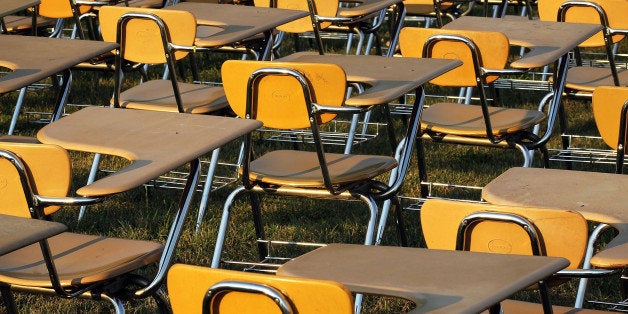 WASHINGTON, DC - JUNE 20: An installation of 857 empty school desks, representing the number of students nationwide who are dropping out every hour of every school day, is on display at the National Mall June 20, 2012 in Washington, DC. The installation was presented by not-for-profit organization College Board to call upon presidential candidates who are running for the White House to make education a more prominent issue in the 2012 campaigns and put the nationâs schools back on track. (Photo by Alex Wong/Getty Images)