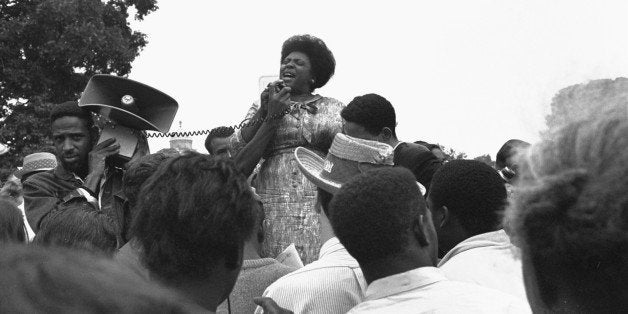 Mrs. Fannie Lou Hamer of Ruleville, MS, speaks to Mississippi Freedom Democratic Party sympathizers outside the Capitol in Wa