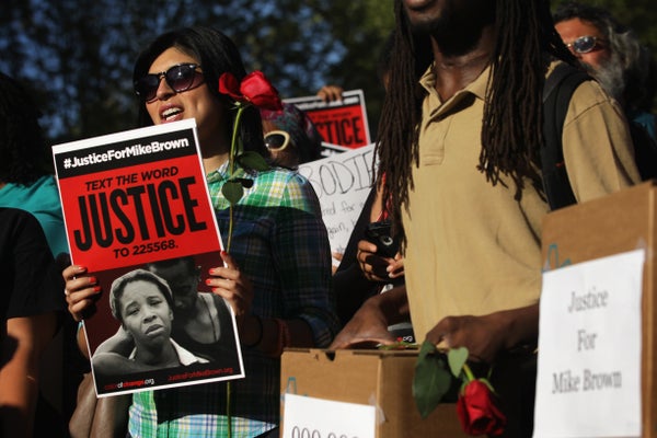 Demonstrators in front of the White House on Thursday called on the Justice Department to fully investigate, prosecute, and f