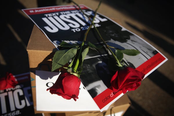  Roses and a poster are seen on top of nearly 950,000 signatures that are delivered to the White House August 28, 2014 on Thu