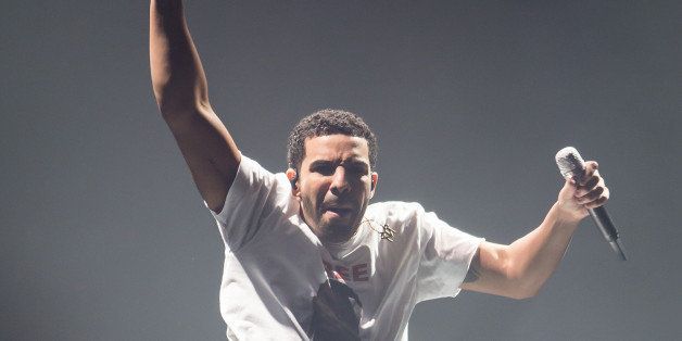 CAMDEN, NJ - AUGUST 21: Rapper Drake performs Drake Vs Lil Wayne Tour at the Susquehanna Bank Center on August 21, 2014 in Camden, New Jersey. (Photo by Gilbert Carrasquillo/Getty Images)
