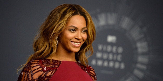 Beyonce poses in the press room at the MTV Video Music Awards at The Forum on Sunday, Aug. 24, 2014, in Inglewood, Calif. (Photo by Jordan Strauss/Invision/AP)