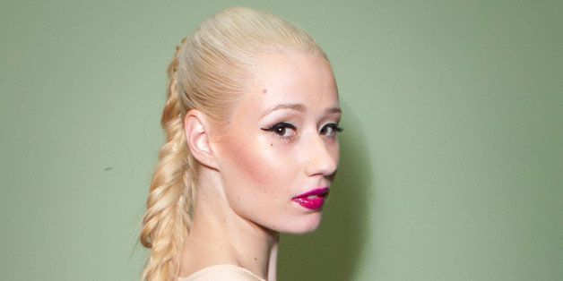 LOS ANGELES, CA - SEPTEMBER 04: Rapper Iggy Azalea poses backstage at the 2012 Closer To My Dreams Tour at Club Nokia on September 4, 2012 in Los Angeles, California. (Photo by Imeh Akpanudosen/Getty Images)