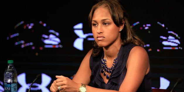 OWINGS MILLS, MD - MAY 23: Janay Rice, the wife of running back Ray Rice of the Baltimore Ravens (not pictured) looks on duri