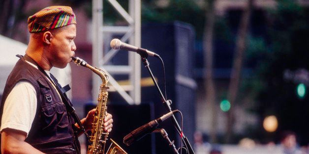 American Jazz musician Steve Coleman plays alto saxophone as he leads his band, 5 Elements, during a JVC Jazz Festival concert in Bryant Park, New York, New York, June 28, 1995. (Photo by Jack Vartoogian/Getty Images)