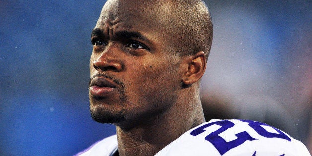 NASHVILLE, TN - AUGUST 28: Running back Adrian Peterson #28 of the Minnesota Vikings looks on during a preseason game again