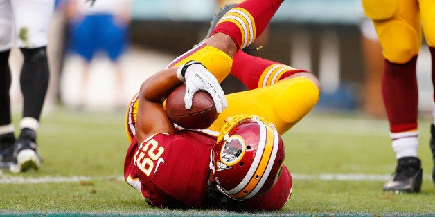 PHILADELPHIA, PA - SEPTEMBER 21: Roy Helu #29 of the Washington Redskins scores a touchdown in the fourth quarter against the Philadelphia Eagles at Lincoln Financial Field on September 21, 2014 in Philadelphia, Pennsylvania. (Photo by Rich Schultz/Getty Images)