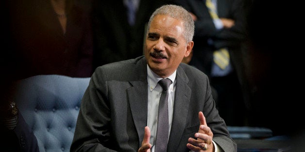 Attorney General Eric Holder meets with former federal inmates who have completed the Supervision to Aid Re-entry (STAR) program Tuesday, Nov. 5, 2013, at the U.S. Courthouse in Philadelphia. Holder is on a planned three-city tour to promote the need for innovative federal programs that help ex-offenders confront their return to society after years in prison. (AP Photo/Matt Rourke)