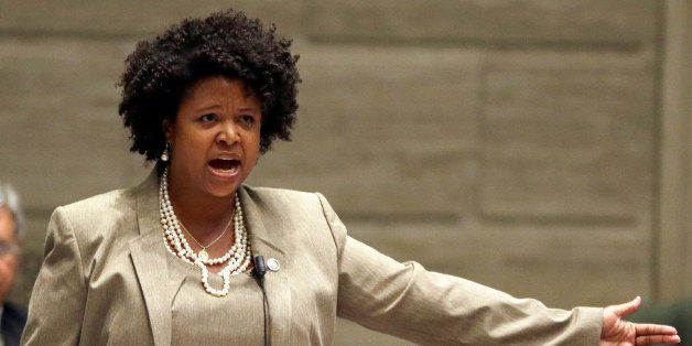 Missouri state Sen. Maria Chappelle-Nadal speaks on the Senate floor Wednesday, Sept. 10, 2014, in Jefferson City, Mo. Chappelle-Nadal, a Democrat who was among the those tear gassed by police while protesting with her constituents in Ferguson, Mo., spoke passionately about being involved in protests after a white police officer fatally shot an unarmed black 18-year-old man. (AP Photo/Jeff Roberson)