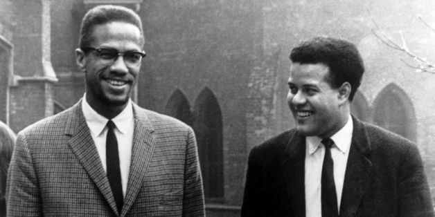 UNITED KINGDOM - DECEMBER 05: MALCOLM X (left), leader of the Organization of Afro-American Unity and member of the BLACK MUSLIMS, is pictured with Eric ABRAHAMS, President of the Oxford Union, after a Press Conference in Oxford, England. (Photo by Keystone-France/Gamma-Keystone via Getty Images)
